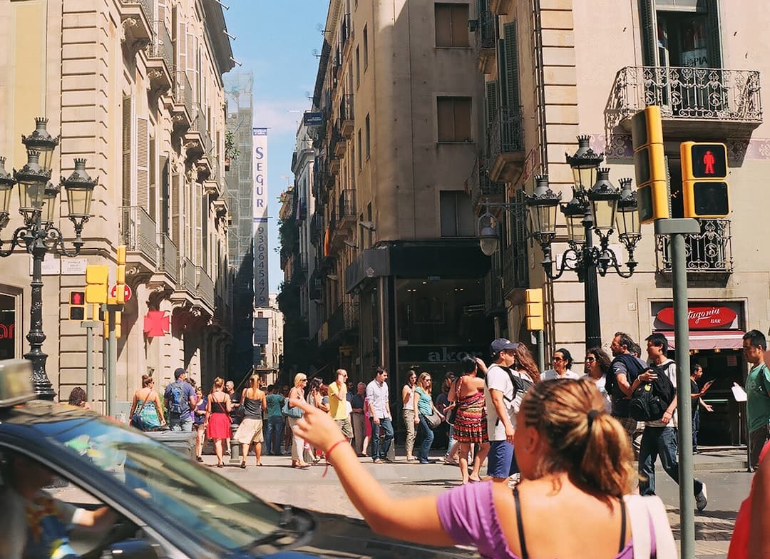 Traveler with smartphone in Barcelona, Spain